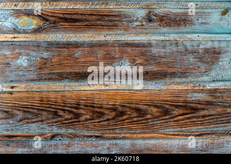 Brown natural wood dark background, vintage, with knots and nail holes, wood planks, old, Rustic Brown Weathered Wood Grain blue orange pained distres Stock Photo