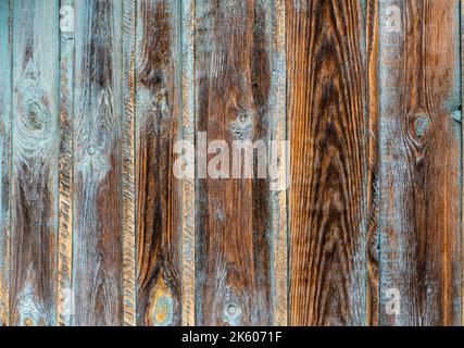 Brown natural wood dark background, vintage, with knots and nail holes, wood planks, old, Rustic Brown Weathered Wood Grain blue orange pained distres Stock Photo
