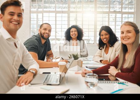 Portrait of happy businesspeople. Diverse group of architects in a meeting. Group of engineers planning, collaborating in a meeting. Smiling Stock Photo