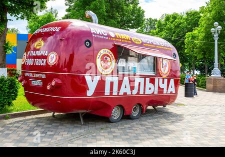 Samara, Russia - June 4, 2022: Food truck, mobile drink and snack van in a city park in summer sunny day Stock Photo