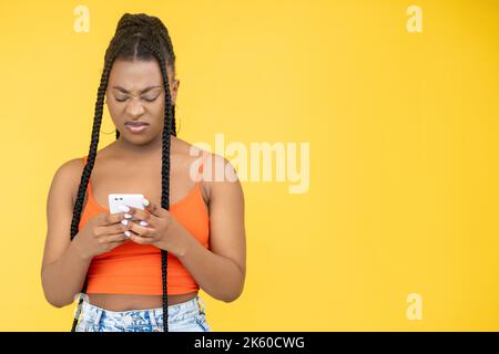bad connection spam message african woman phone Stock Photo