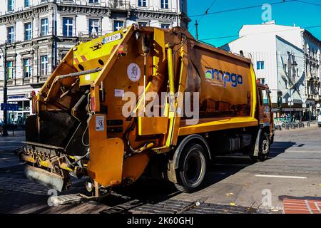 Krakow, Poland - October 08, 2022 Garbage truck driving in the city center of Krakow in Poland Stock Photo