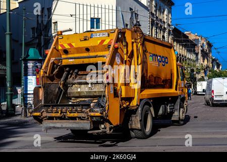 Krakow, Poland - October 08, 2022 Garbage truck driving in the city center of Krakow in Poland Stock Photo