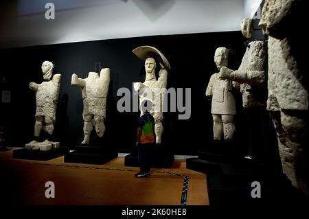 Giant statues of Monte Prama, Cabras civic and archeological museum 'Giovanni Marongiu', Cabras, Sardinia, Italy, Europe Stock Photo