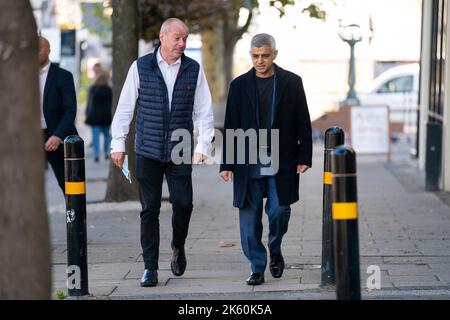 The Mayor of London Sadiq Khan arrives to receive his flu vaccination and Covid-19 booster jab, at the health clinic at Pearl Chemist in London. Picture date: Tuesday October 11, 2022. Stock Photo