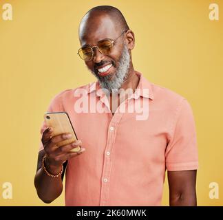 Handsome bald man with beard wearing elegant shirt over isolated pink ...