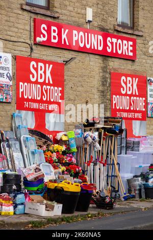 Families and women and old people use the Pound store and a discount store to shop in the town of Wyke situated within the City of Bradford boundaries. As the cost of living crisis bites and hits people on lower incomes more are turning to discount shops to save money.Credit: Windmill Images/Alamy Live News Stock Photo