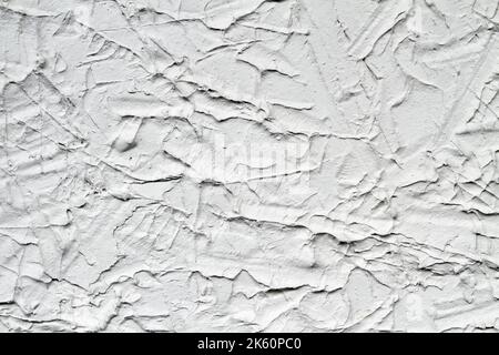 Decorative gray plaster effect on wall. Plaster texture. Closeup Stock Photo