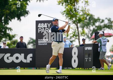 Lee Westwood of England tees off at hole 8 during the final round of the LIV Golf Invitational Bangkok at Stonehill Golf Course in Bangkok, THAILAND Stock Photo