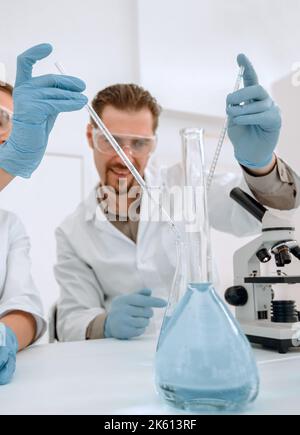 medical technicians working in laboratory Stock Photo