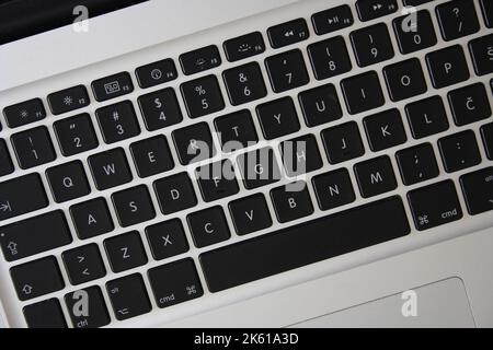 A part of the keyboard on the modern portable computer - laptop Stock Photo