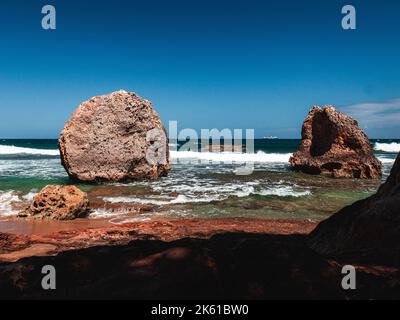 Puerto rico Aguadilla survival beach caves with big rocks formation from the caribbean coast puerto rico northwest side. Island coast nature structure Stock Photo