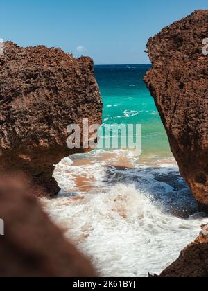 Puerto rico Aguadilla survival beach caves with big rocks formation from the caribbean coast puerto rico northwest side. Island coast nature structure Stock Photo