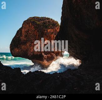 Puerto rico Aguadilla survival beach caves with big rocks formation from the caribbean coast puerto rico northwest side. Island coast nature structure Stock Photo