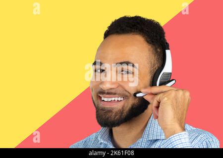 Corporate Professional Call Centre Agent with headphones on his head Stock Photo