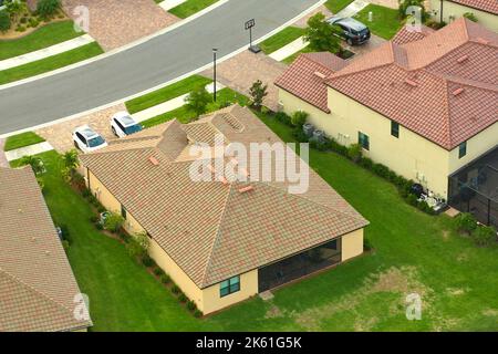 Aerial view of typical contemporary american private house with roof top covered with ceramic shingles and double garage Stock Photo