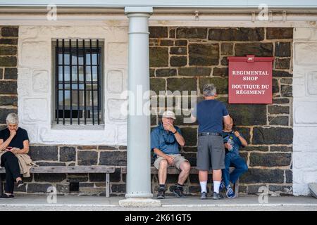 Halifax, Nova Scotai, Canada -- Sept 13. 2022. Photo of tourists sitting outside the gift shop at Fort George in Halifax, Nova Scotia Stock Photo