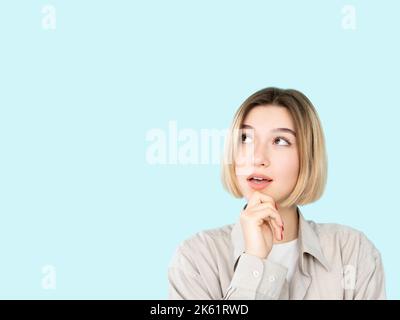 choose product puzzled woman proposition offer Stock Photo