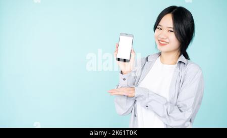 mobile phone presentation asian woman best offer Stock Photo