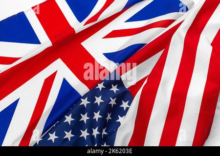 Flags of the USA and brithish Union Jack flag together waving Stock Photo