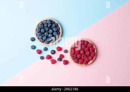 Creative summer background made from fresh berries. Flat lay, copy space. Stock Photo