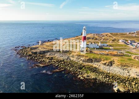Portland Bill, Dorset, UK.  11th October 2022.  UK Weather.  View from the air of Portland Bill peninsula and the Isle of Portland in Dorset on a warm clear sunny autumn afternoon.  Picture Credit: Graham Hunt/Alamy Live News Stock Photo