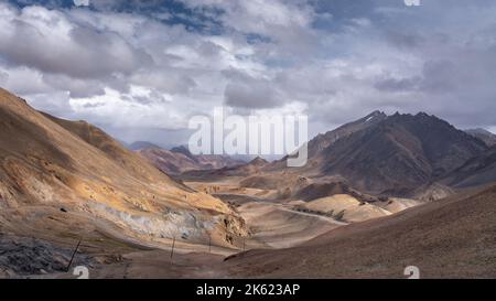 Scenic mountain landscape view at high altitude Ak Baital pass, highest on the Pamir Highway, Murghab, Gorno-Badakshan, Tajikistan Stock Photo