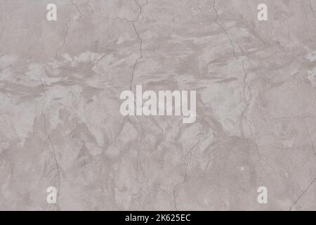 Blank plastered wall beige color with cracks Stock Photo