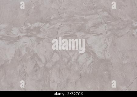 Blank plastered wall beige color with cracks Stock Photo