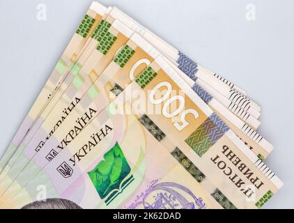 heap of five hundred ukrainian hryvna banknotes closeup on white Stock Photo