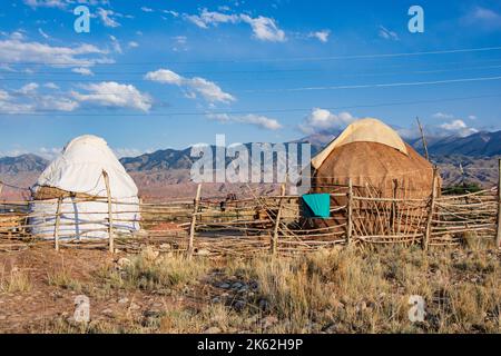 Yurts in Kyrgyzstan near Issyk Kul lake, Skaska Canyon, Bokonbayevo and Tong. Sleeping in yurt camp, Central Asia landscape. Holiday in central Asia, Stock Photo