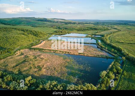 Aerial view of fish hetching pond with blue water in aquacultural area Stock Photo