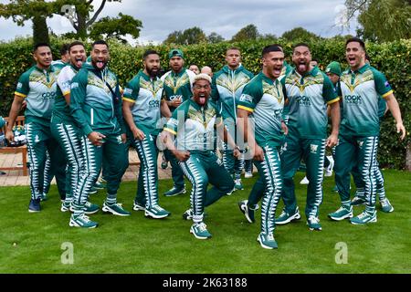 Darlington, UK. 11 Oct 2022. The Cook Islands men’s Rugby League World Cup team have arrived at Rockliffe Hall, where they will be based for three weeks during their RLWC2021 campaign which includes a game against rivals Tonga at Middlesbrough’s Riverside Stadium. The squad were greeted with a youth brass band and young players from Yarm Wolves before meeting local representatives and the media. They also performed the Haka. Credit: Teesside Snapper/Alamy Live News Stock Photo