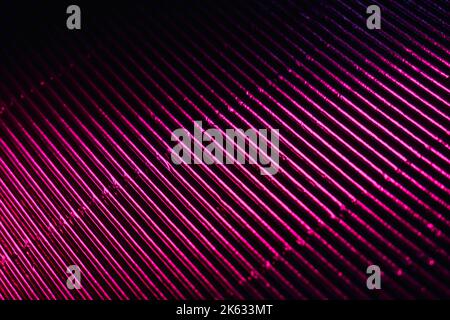 color glow background grooved texture neon pink Stock Photo