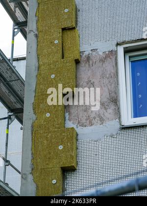 Multistorey apartment house facade thermal insulation with thick mineral rockwool slabs Stock Photo