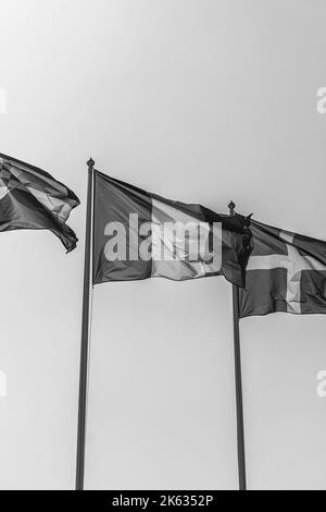 The national flag of France is a tricolour featuring three vertical bands coloured blue, white, and red. Stock Photo