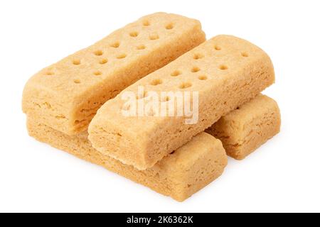 Stack of four butter shortbread finger biscuits isolated on white. Stock Photo