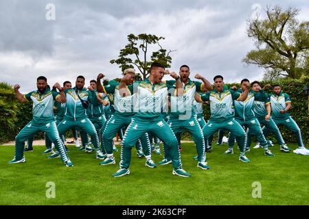 Darlington, UK. 11 Oct 2022. The Cook Islands men’s Rugby League World Cup team have arrived at Rockliffe Hall, where they will be based for three weeks during their RLWC2021 campaign which includes a game against rivals Tonga at Middlesbrough’s Riverside Stadium. The squad were greeted with a youth brass band and young players from Yarm Wolves before meeting local representatives and the media. They also performed the Haka. Credit: Teesside Snapper/Alamy Live News Stock Photo