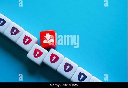 Security breach at a weak spot. Hacker attack. Data leakage, industrial espionage. Theft of confidential information. Security vulnerabilities, intrus Stock Photo