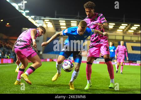 Peterborough, UK. 11th October 2022. Joe Ward (23 Peterborough United) challenged by Myles Peart Harris (25 Frest Green Rovers) during the Sky Bet League 1 match between Peterborough and Forest Green Rovers at London Road, Peterborough on Tuesday 11th October 2022. (Credit: Kevin Hodgson | MI News) Credit: MI News & Sport /Alamy Live News Stock Photo