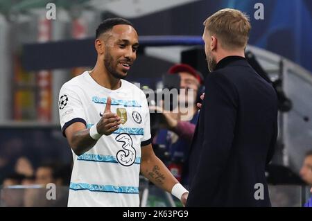 Chelsea's Pierre-Emerick Aubameyang (left) shakes hands with Chelsea manager Graham Potter during the UEFA Champions League Group E match at San Siro Stadium, Milan. Picture date: Tuesday October 11, 2022. Stock Photo