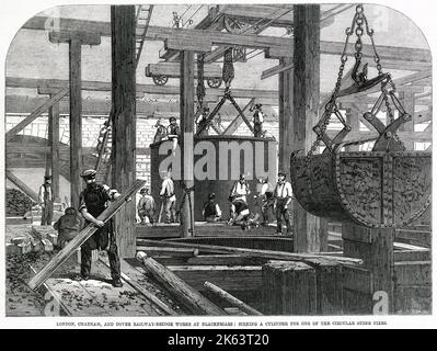 The works for the London, Chatham and Dover Railway Bridge at Blackfriars, London. Sinking a cylinder for one of the stone piers. Stock Photo
