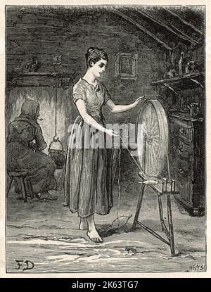 Scene inside a cottage in the west of Ireland, showing an Irish girl spinning while a pipe-smoking older woman watches a pot on the fire.      Date: 1880 Stock Photo