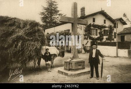 Departure for Mass in the French Basque Country, or Northern Basque Country - a region lying on the west of the French department of the Pyrenees-Atlantiques. Stock Photo