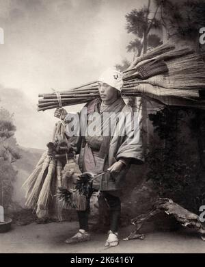 Vintage 19th century photograph: Broom and feather duster seller, Japan Stock Photo