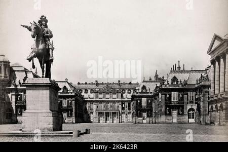 Vintage late 19th century photograph - equestrian statue of King Louis XIV outside the palace of Versailles, France Stock Photo
