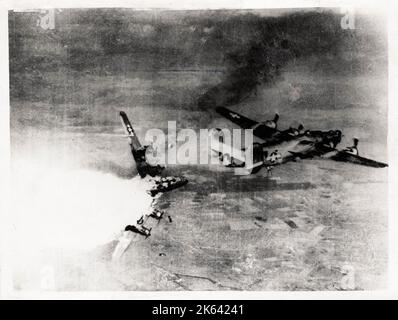 Vintage World War II photograph - B-24H Liberator bomber of 783rd Bomb Squadron, 465th Bomb Group, US 15th Air Force exploding in mid air after being hit by anti-aircraft fire over Germany, 1944 Stock Photo