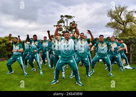 Darlington, UK. 11 Oct 2022. The Cook Islands men’s Rugby League World Cup team have arrived at Rockliffe Hall, where they will be based for three weeks during their RLWC2021 campaign which includes a game against rivals Tonga at Middlesbrough’s Riverside Stadium. The squad were greeted with a youth brass band and young players from Yarm Wolves before meeting local representatives and the media. They also performed the Haka. Credit: Teesside Snapper/Alamy Live News Stock Photo