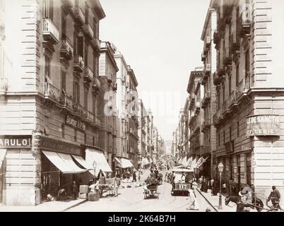 Vintage 19th century photograph: street scene, Naples, Napoli, Italy - Via Del Duomo. Stock Photo