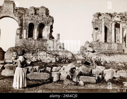 Vintage 19th century photograph - Greek Theatre at Taormina, Sicily. Taormina is a hilltop town on the east coast of Sicily. It sits near Mount Etna. Stock Photo